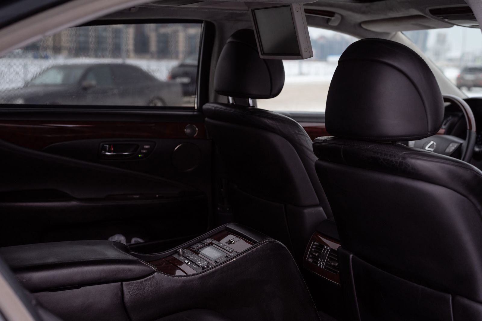Quilted beige leather seating inside a luxury car